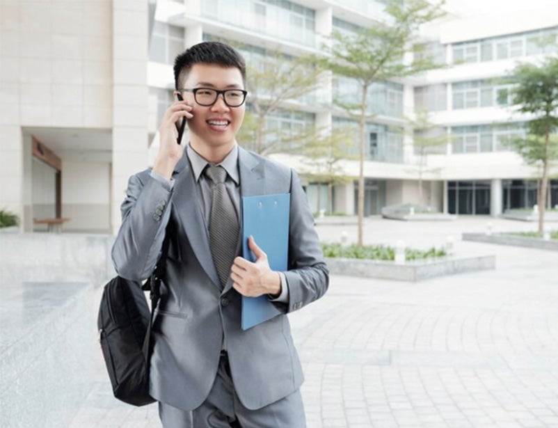 Young business man on phone